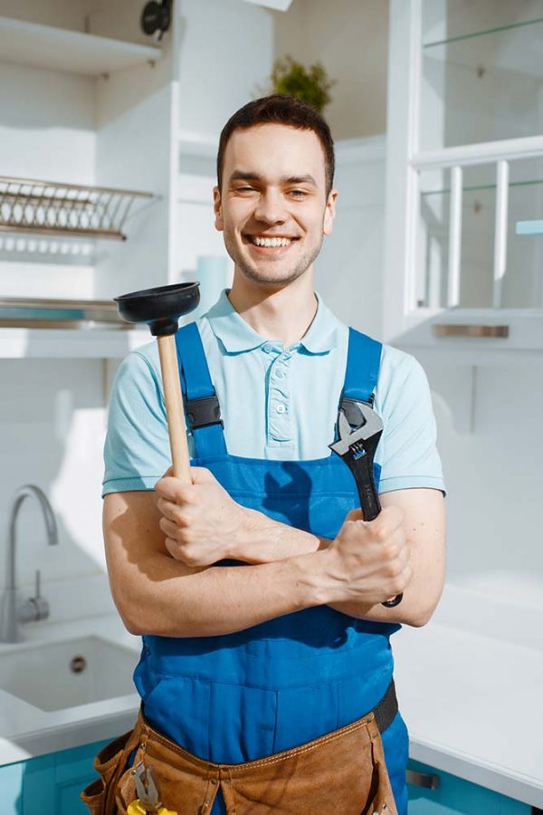 cheerful-male-plumber-holds-wrench-and-plunger-resize.jpg cheerful-male-plumber-holds-wrench-and-plunger-resize.jpg