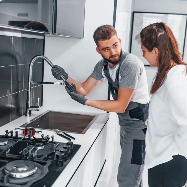 young-professional-plumber-in-grey-uniform-shows-r-resize.jpg young-professional-plumber-in-grey-uniform-shows-r-resize.jpg